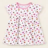 White cotton dress with a pink floral and heart print, baby size 3–6 months, front