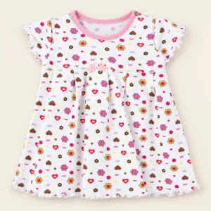 White cotton dress with a pink floral and heart print, baby size 3–6 months, front