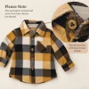 Primark checked flannel shirt, close-up of the top button resewn with blue thread