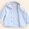 Zipzap3.png Zip Zap light blue velour wrap jacket shown open with the striped hood lining