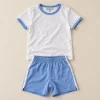 Destination girls' ringer tee and shorts set in white and blue, size 13 years (158 cm), front