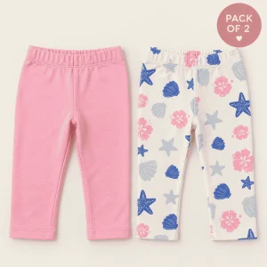 Pepco Baby leggings 2-pack in plain pink and a white sea print, baby size 9–12 months