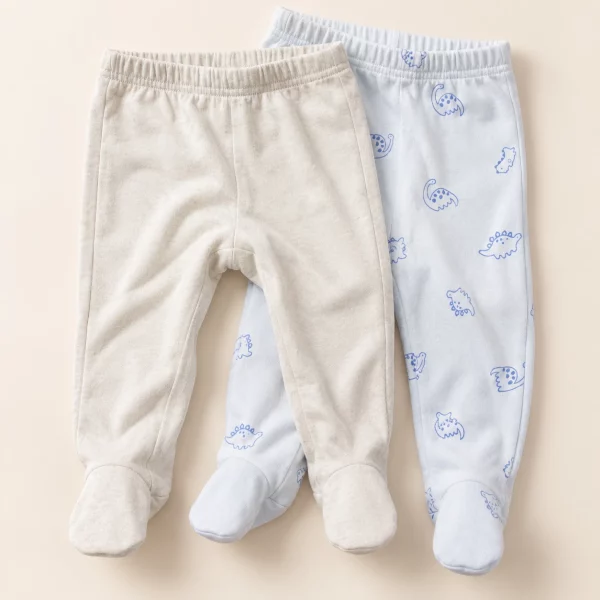 dinosaur-footed-leggings-2-pack-oatmeal-blue So Cute footed leggings 2-pack, 6–9 months, oatmeal marl pair and pale blue dinosaur print pair side by side