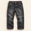 F&F five-pocket jeans in washed black, size 6-7 years (122 cm), front with brass button and rivets