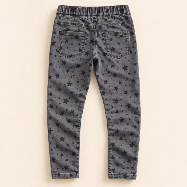 F&F stretch jeans in washed grey with black star print, size 12-13 years (158 cm), back with two pockets