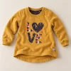 LOVE sweatshirt, mustard Liegelind by NKD LOVE sweatshirt in mustard, 9–12 months, front with floral appliqué heart and shoulder poppers