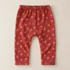 Topomini mushroom print leggings in rust, 9–12 months, front with elastic waist and heart patch