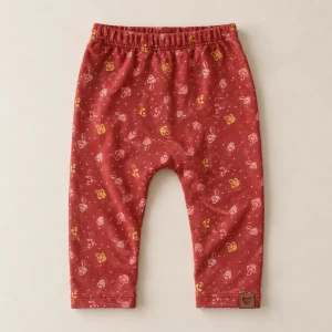Topomini mushroom print leggings in rust, 9–12 months, front with elastic waist and heart patch